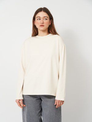 Женский лонгслив оверсайз, стрейч-кулир, кремовий L/XL 32546576787 фото