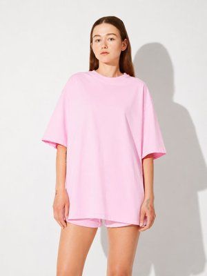 Жіночий рожевий костюм із шортами та футболкою oversize L 699003 фото